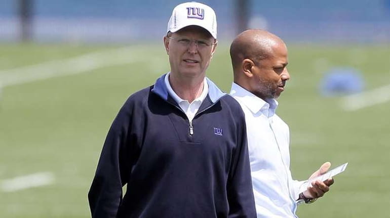 Giants co-owner John Mara, left, and general manager Jerry Reese...