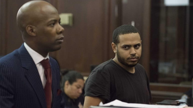 Christopher Cruz, 28, is arraigned on charges of unlawful imprisonment...