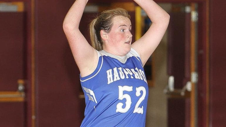 Hauppauge's Lindsey Devine looks to pass in the second quarter...