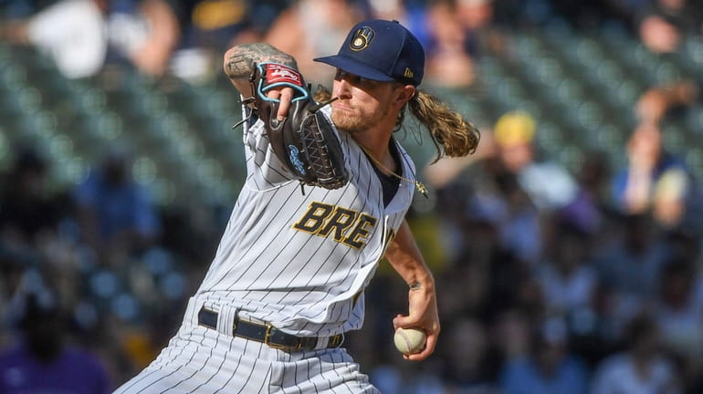 Milwaukee Brewers' Josh Hader pitches during the ninth inning of...