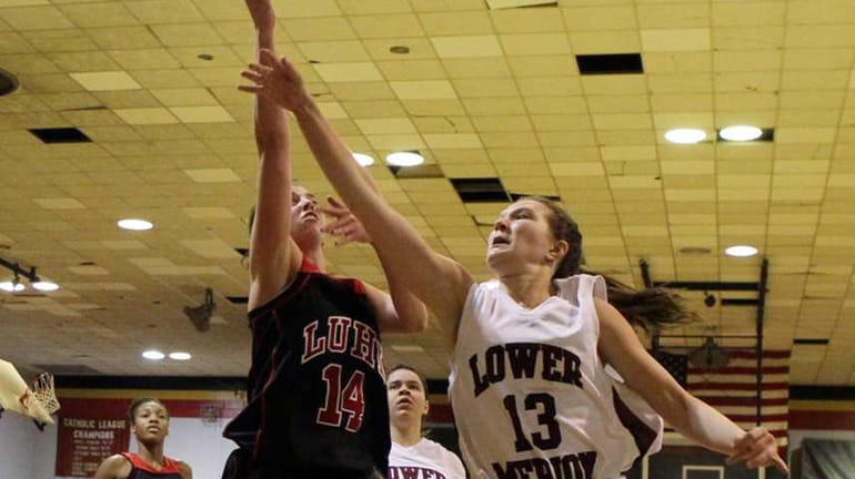 Paige Krifcher of Long Island Lutheran lays up a basket...