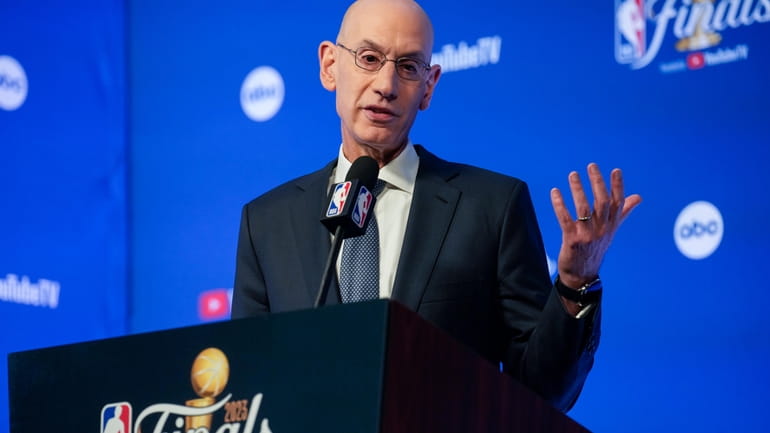 NBA Commissioner Adam Silver speaks to reporters before Game 1...