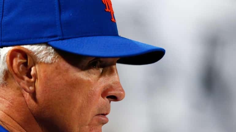 Terry Collins #10 of the Mets looks on during the...