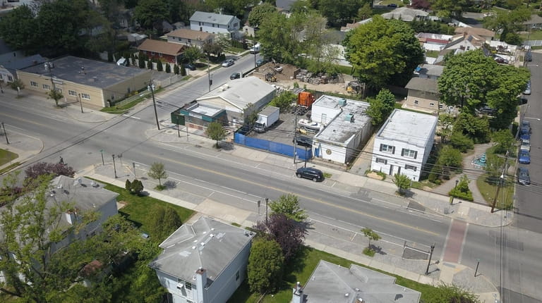 An aerial view of properties near the intersection of Magnolia...