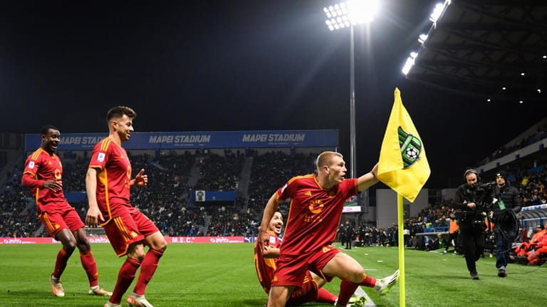 Roma's Rasmus Kristensen celebrates after scoring a goal, during the...