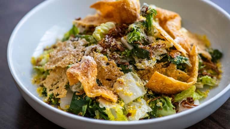 The Tokyo Caesar salad with bok choy, garlic-anchovy kewpie and cured...