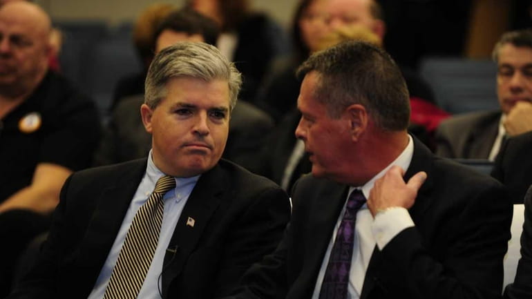 Suffolk County Executive Steve Bellone, left, and Suffolk County Comptroller...