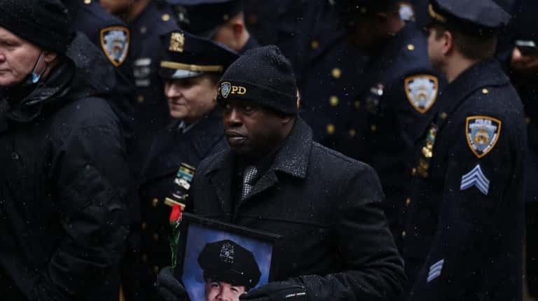 Slain NYPD Officer Jason Rivera is shown in an undated...
