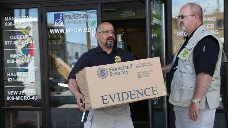 Investigators of the Department of Homeland Security raid the Micropower...