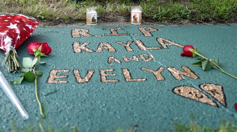 Street memorial honoring Kayla Cuevas, Nisa Mickens and Evelyn Rodriguez,...