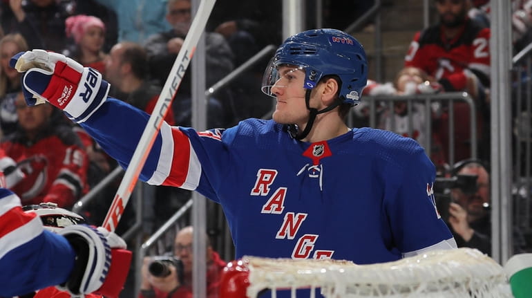 Adam Fox of the Rangers celebrates his goal against the Devils at...