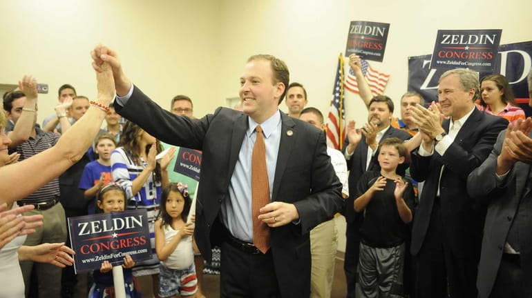 State Sen. Lee Zeldin celebrates with his family and supporters...