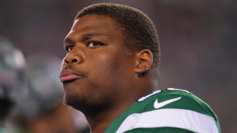 Quinnen Williams #95 of the New York Jets looks on...