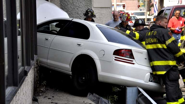 A Dodge Stratus smashed into Bravo Supermarket in Huntington, Wednesday....
