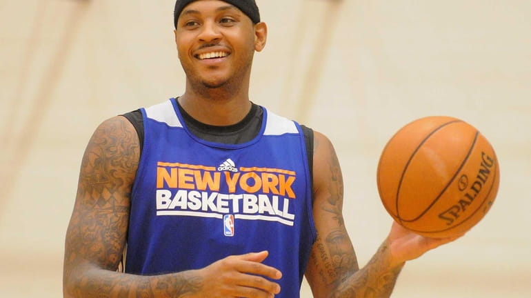 Carmelo Anthony practices during team training camp. (Oct. 8, 2012)