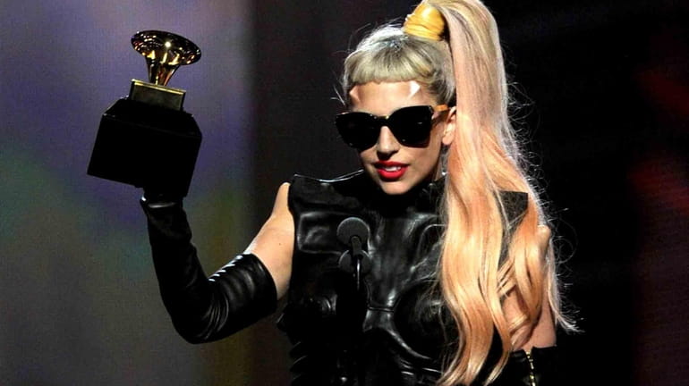 Singer Lady Gaga accepts the Best Pop Vocal Album award...