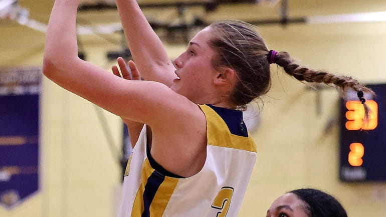 Shoreham-Wading River guard Sophie Costello hits the jump shot for...