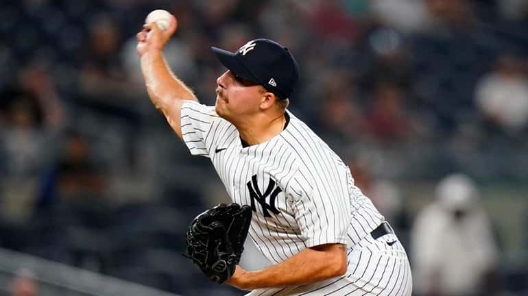 Greg Weissert pitches during the ninth inning of the Yankees'...