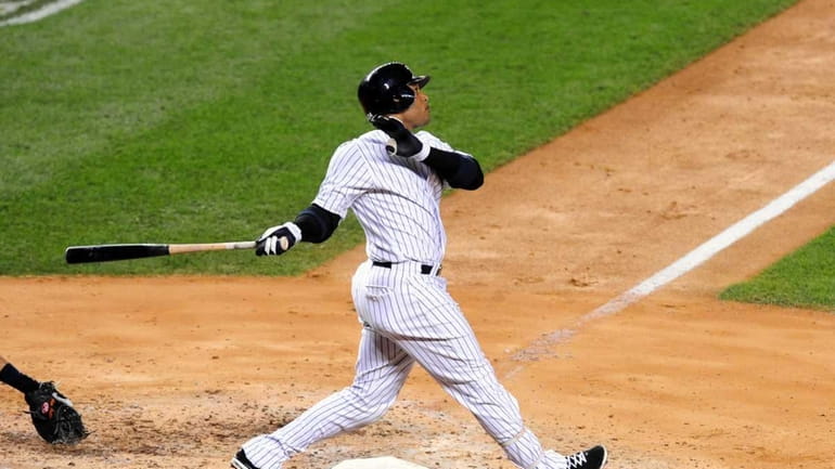 Robinson Cano hits a grand slam to give the Yankees...