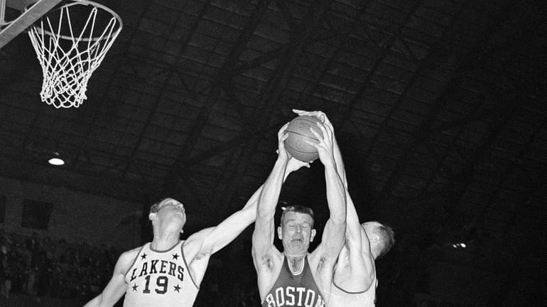 In this April 9, 1959, file photo, Boston Celtics' Jim...