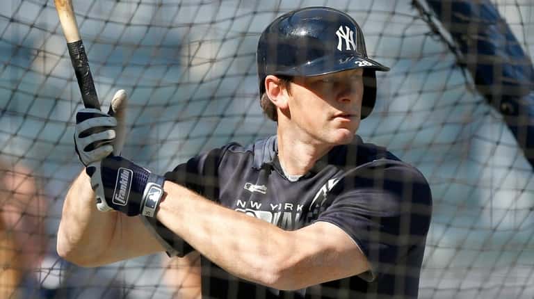 DJ LeMahieu of the Yankees takes batting practice before Game 3...