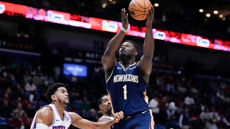 New Orleans Pelicans forward Zion Williamson (1) drives to the...
