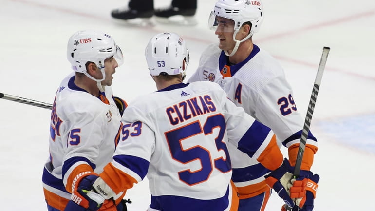 Islanders' Brock Nelson (29) celebrates after his empty-net goal with...