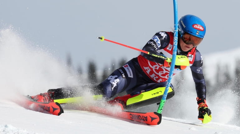 United States' Mikaela Shiffrin speeds down the course during an...