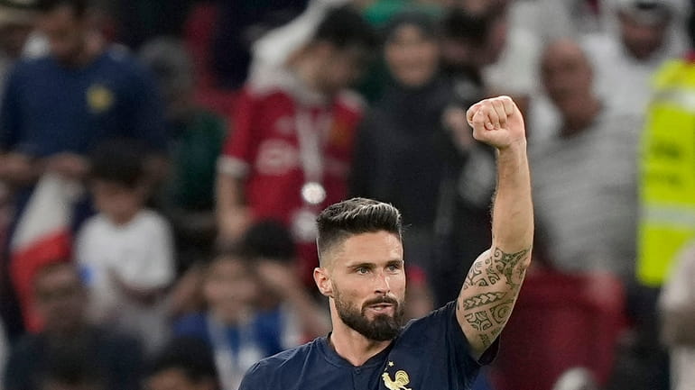 France's Olivier Giroud celebrates scoring his side's first goal during...