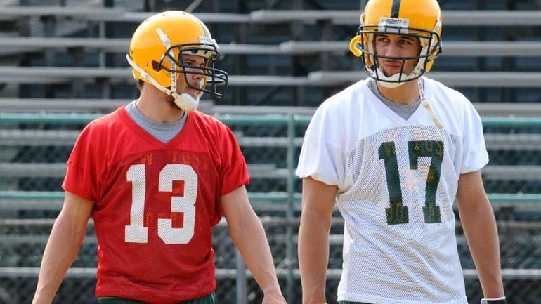 C.W. Post quarterback #13 Steven Laurino, left, and brother /...