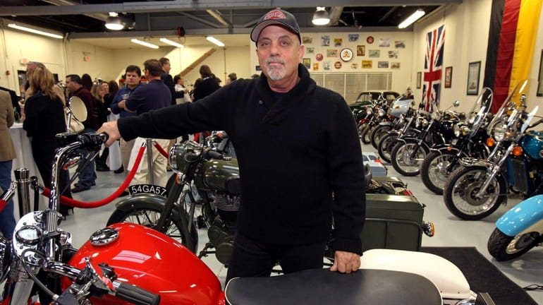 Billy Joel at his motorcycle shop, 20th Century Cycles, in...