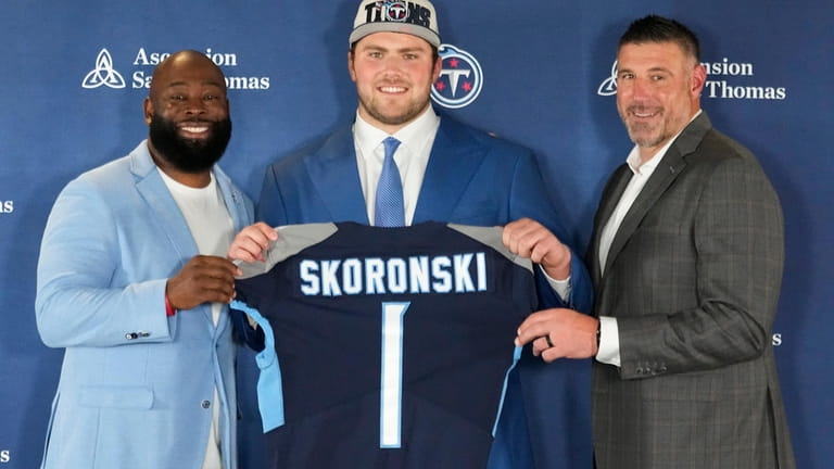 From left to right, Tennessee Titans football general manager Ran...