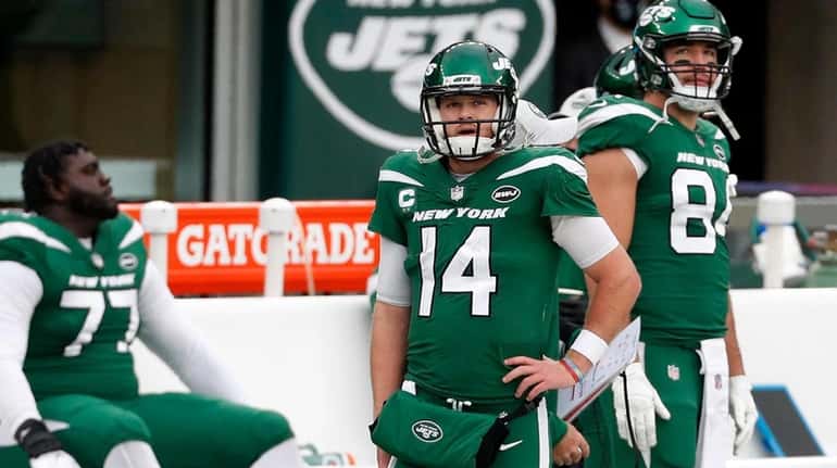 Sam Darnold #14 of the Jets walks on the sidelines late...