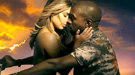 Kim Kardashian and Kanye West in his music video for...