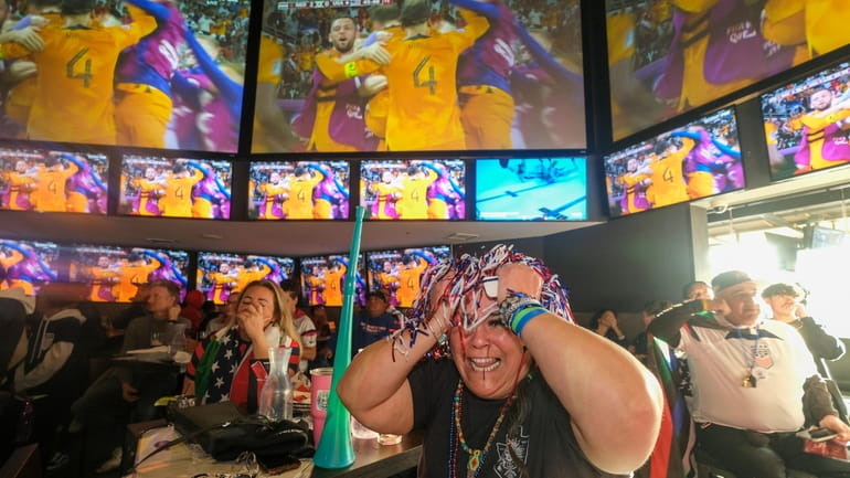 Soccer fan Misty Alvarez reacts at watch party after the...