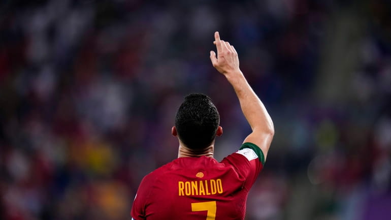 Portugal's Cristiano Ronaldo celebrates after scoring from the penalty spot...