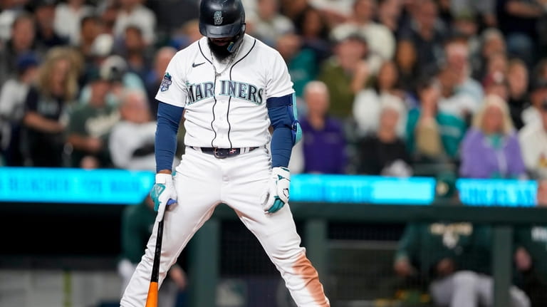 Seattle Mariners' Teoscar Hernandez reacts to being called out on...