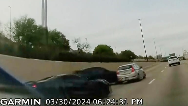In this screen grab taken from dash camera video provided...