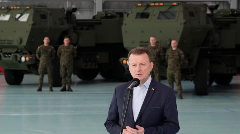 Poland's Defense Minister Mariusz Blaszczak speaks during ceremony after receiving...