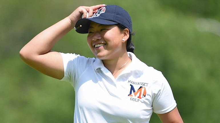 Madison Chen of Manhasset reacts after sinking her final shot...