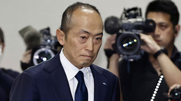 Akihiro Kobayashi, president of Kobayashi Pharmaceutical Co., arrives at a...