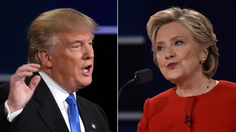 Donald Trump and Hillary Clinton speak during the presidential debate...