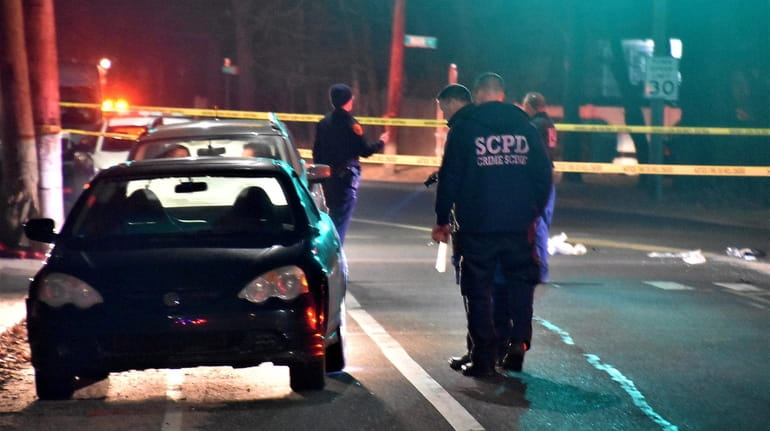 Suffolk County investigate at the scene of the fatal hit-and-run...