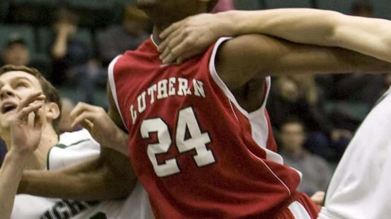 Long Island Lutheran's Achraf Yacoubou (24) is Newsday's boys basketball...