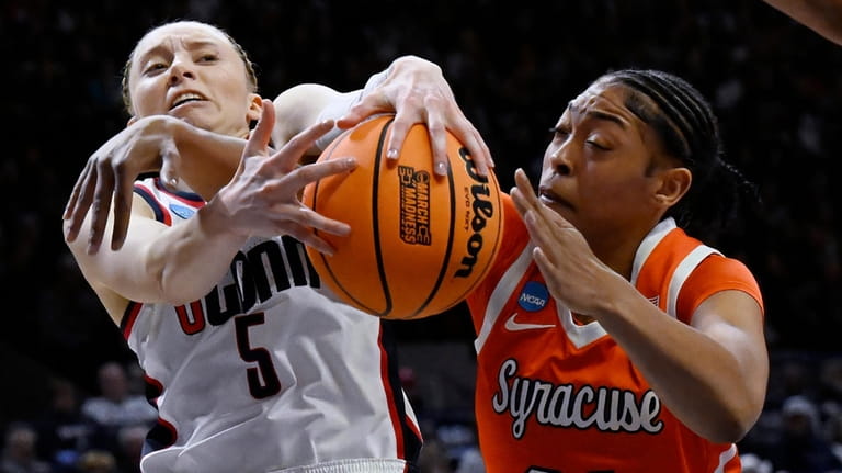 UConn guard Paige Bueckers (5) and Syracuse forward Saniaa Wilson...