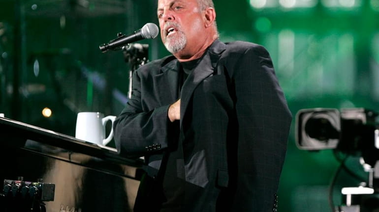Billy Joel performs at Shea Stadium in Queens. (July 16,...
