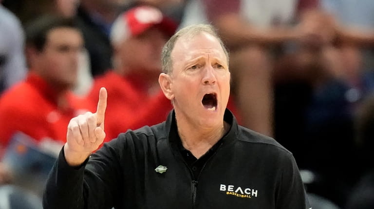 Long Beach State head coach Dan Monson shouts during the...