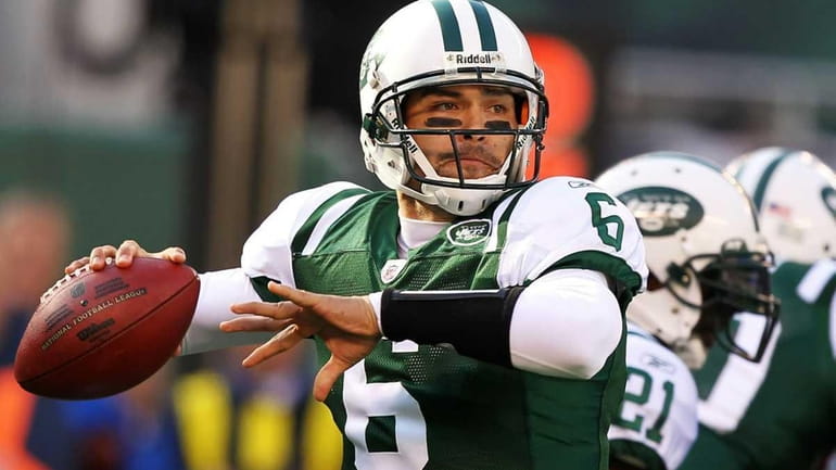 Mark Sanchez of the New York Jets throws against the...