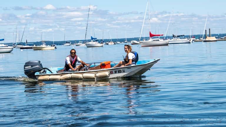 Shepard Stone, left, and Emma Vandorn are sailing instructors for Sea...