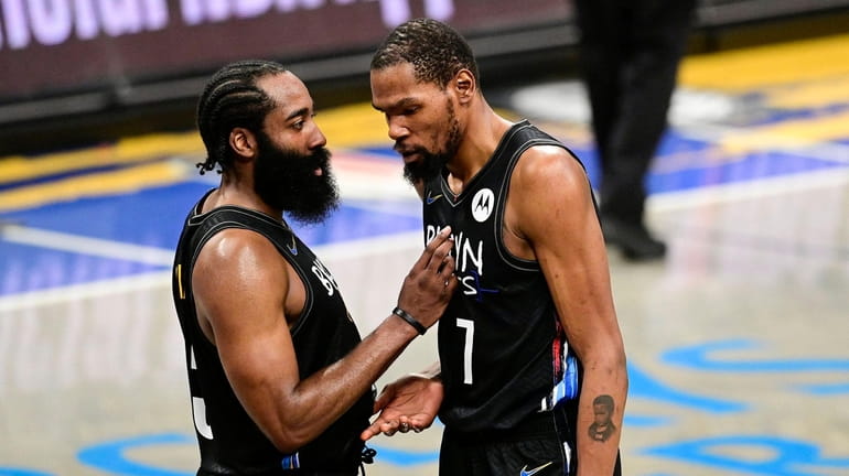 James Harden #13 and Kevin Durant #7 of the Nets...